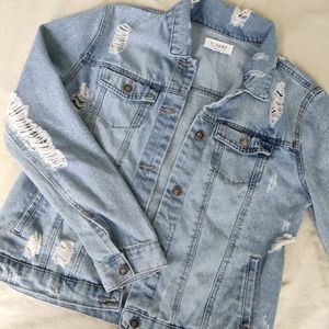 Distressed jean jacket size XL